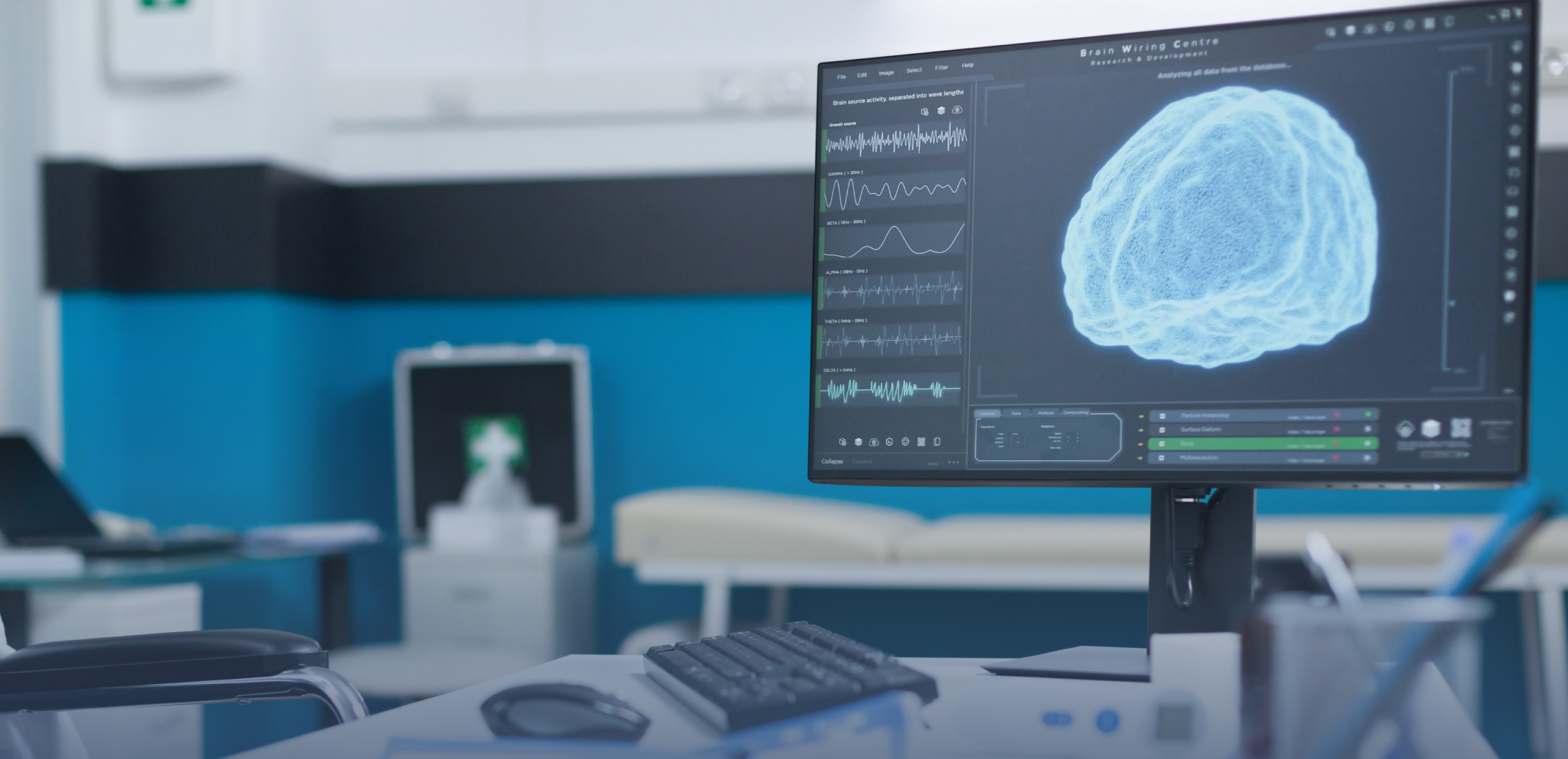 Computer monitor in a medical office displaying a 3D brain scan and neural waveform data labeled by frequency bands. The room includes an examination table, desk, chair, and various medical equipment against blue and white walls.